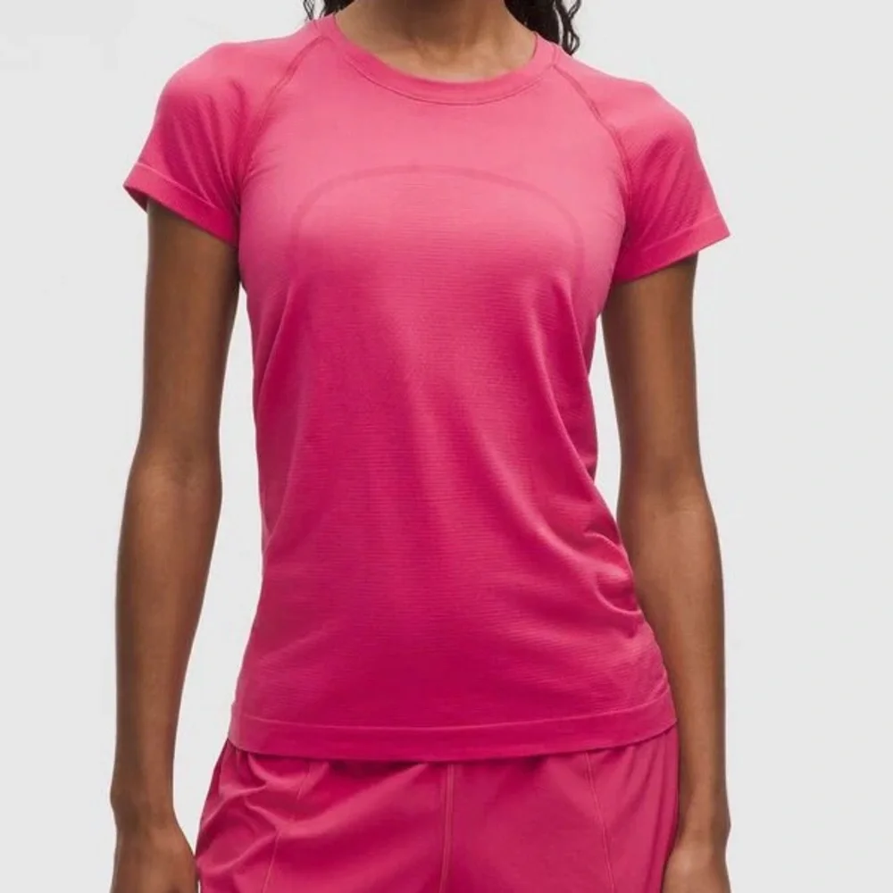 Lululemon short sleeve tech shirt, hip length. size 4
